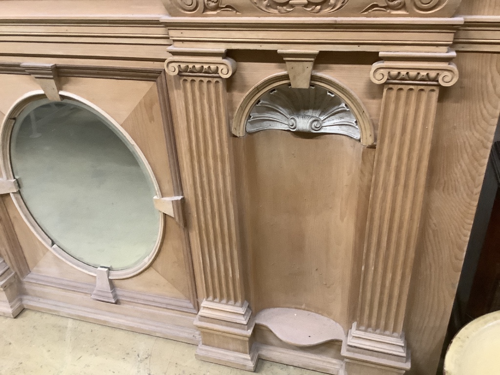 A pine overmantel mirror, length 208cm, width 46cm, height 110cm